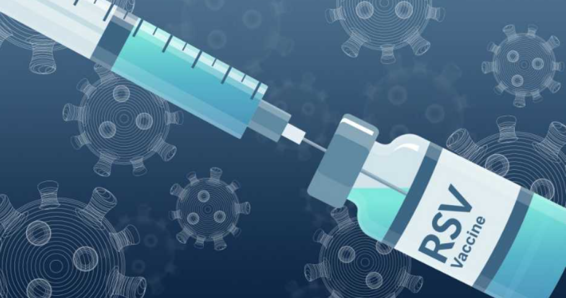 A needle withdraws the vaccine in an RSV vial.